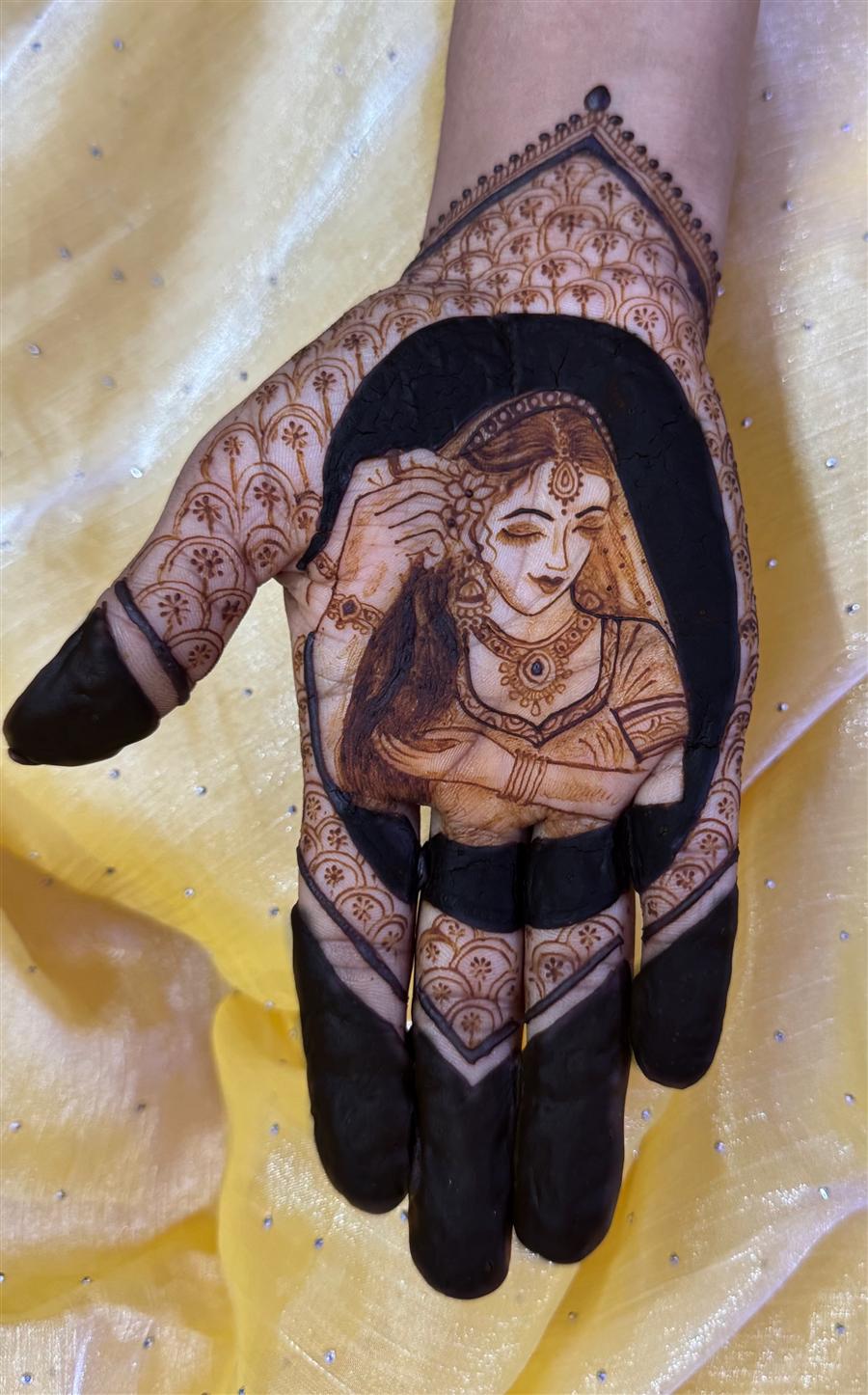 Bride adorning herself, drawn in henna on a palm