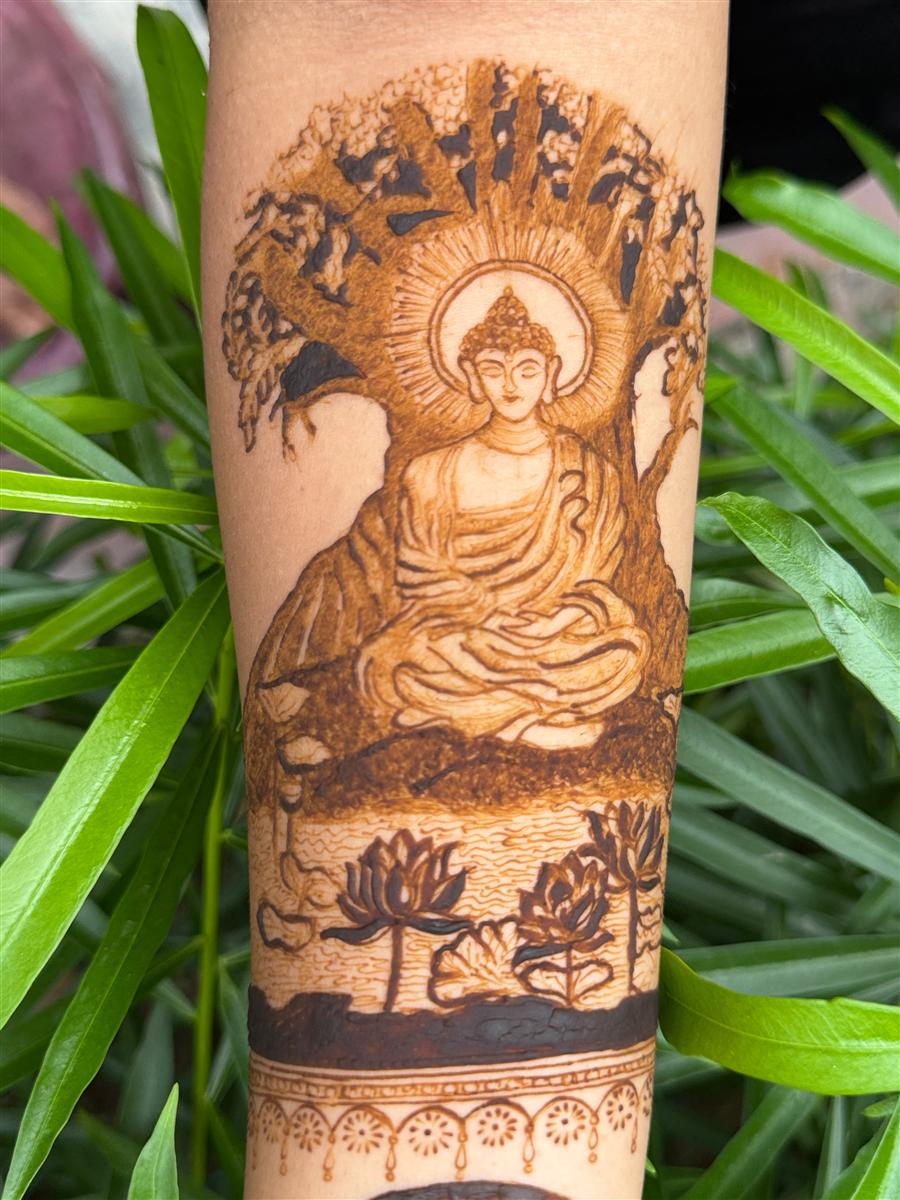 Buddha under the Bodhi tree drawn in henna